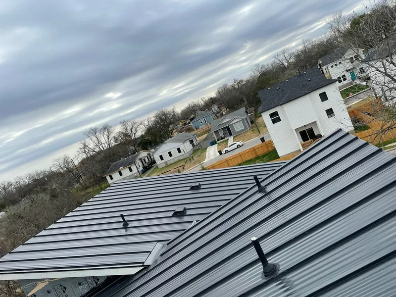 Standing seam metal roof panels with vents for Skylight Repair in Emmett